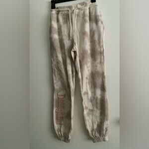 Disneyland Resort acid wash tie-dye unisex joggers in a cream and taupe. XS